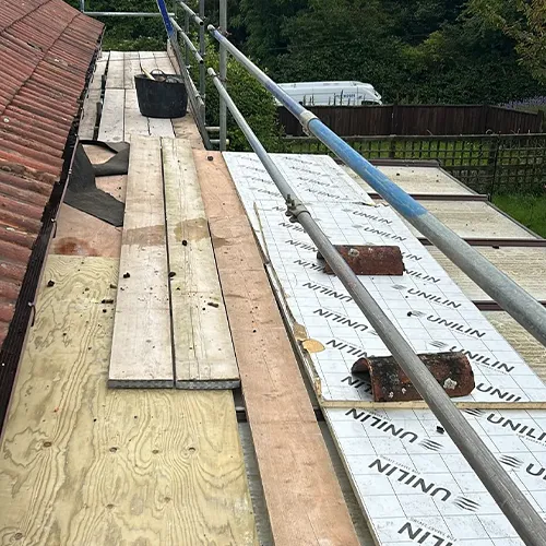 The roof of a house is being constructed.